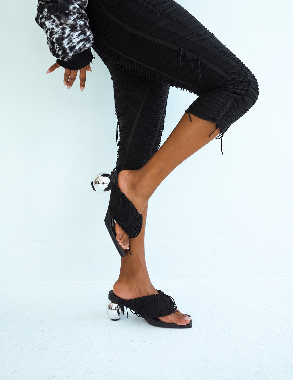 Black Fringe Orbit Sandals