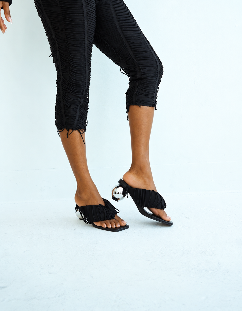 Black Fringe Orbit Sandals
