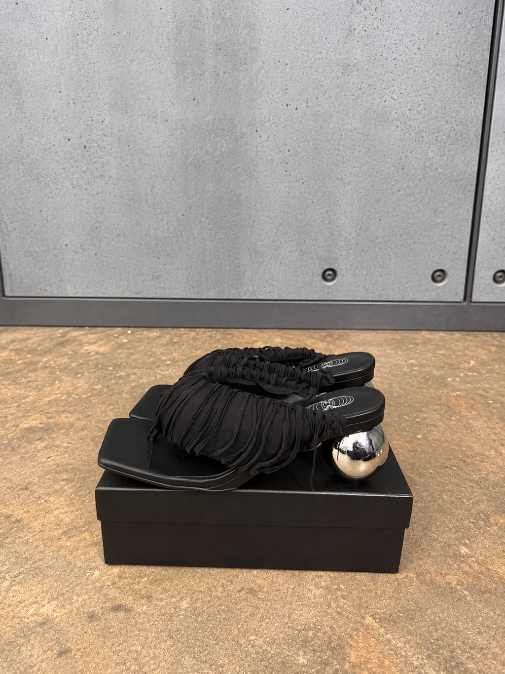 Black Fringe Orbit Sandals
