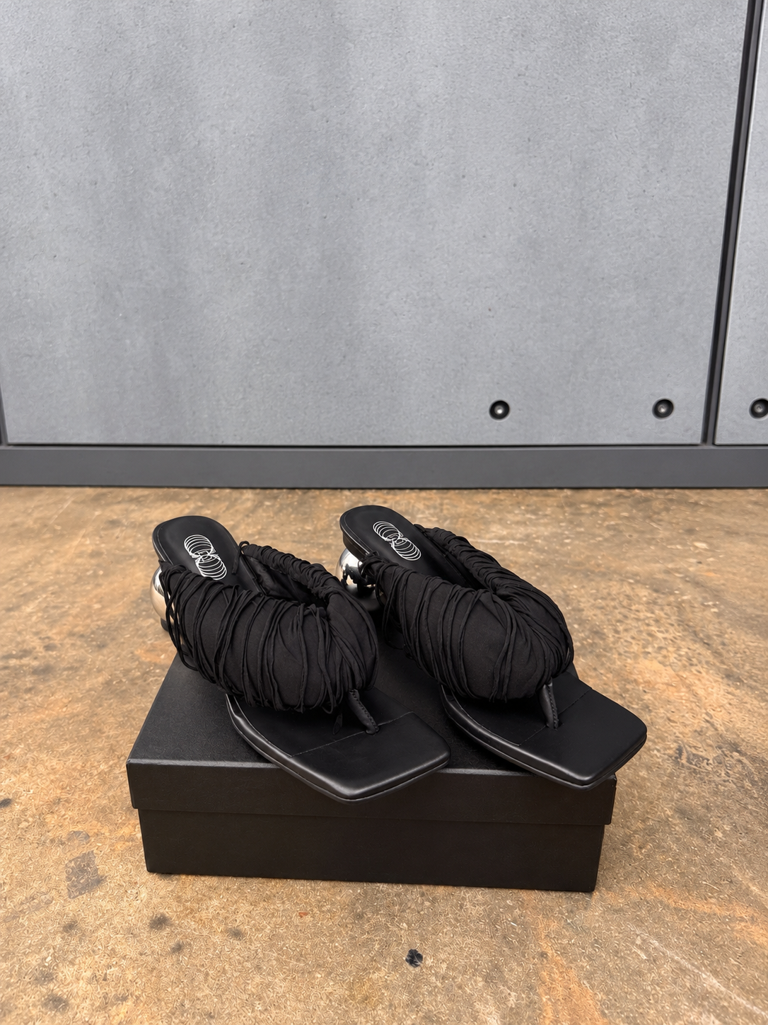 Black Fringe Orbit Sandals