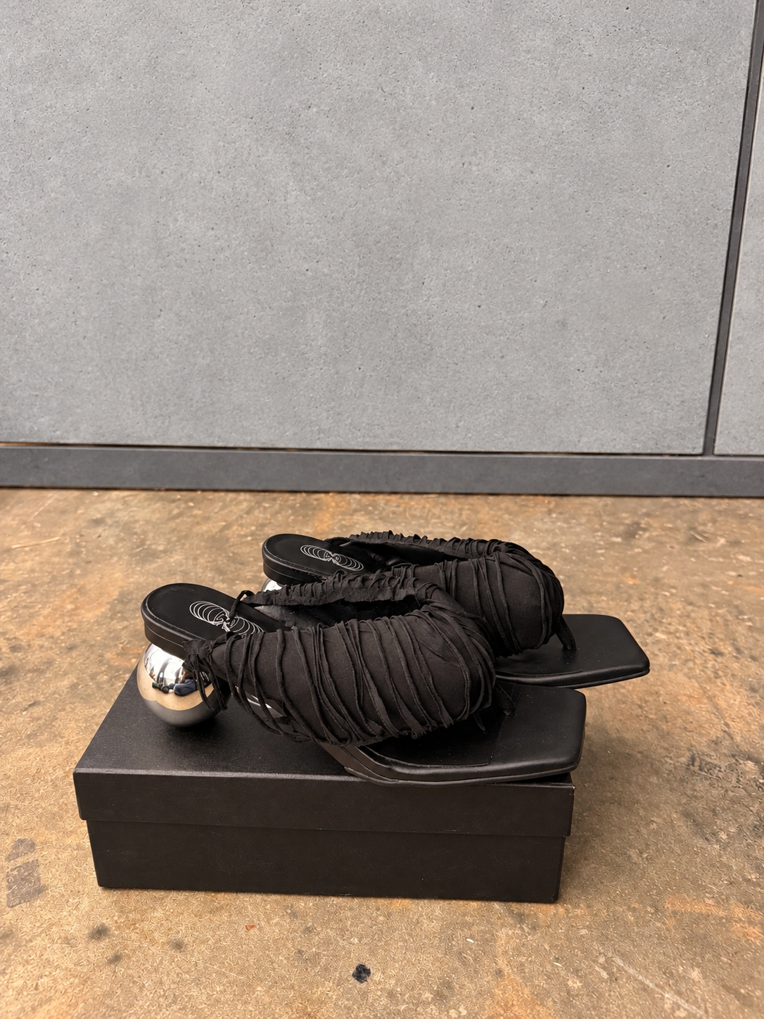 Black Fringe Orbit Sandals