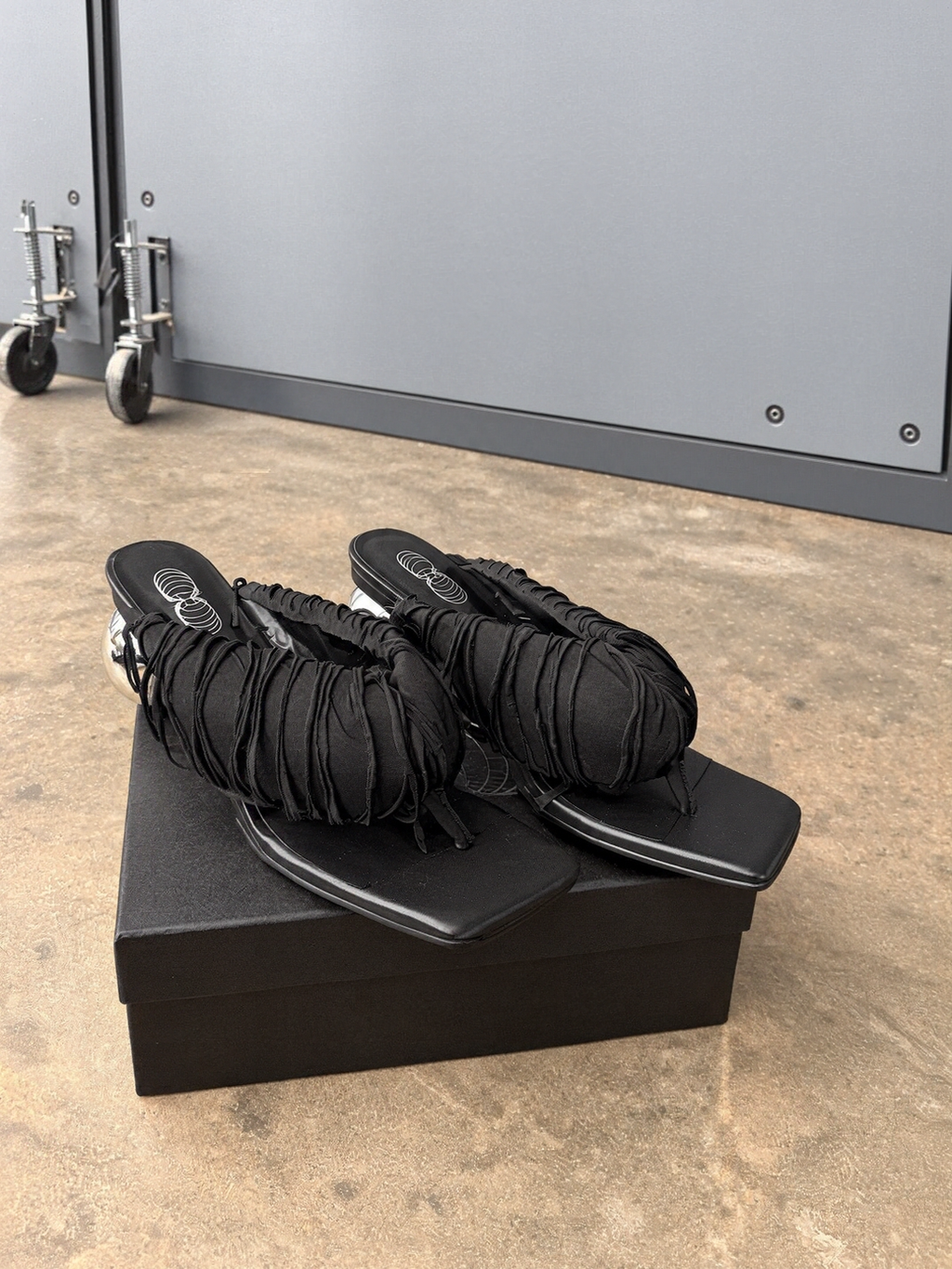 Black Fringe Orbit Sandals